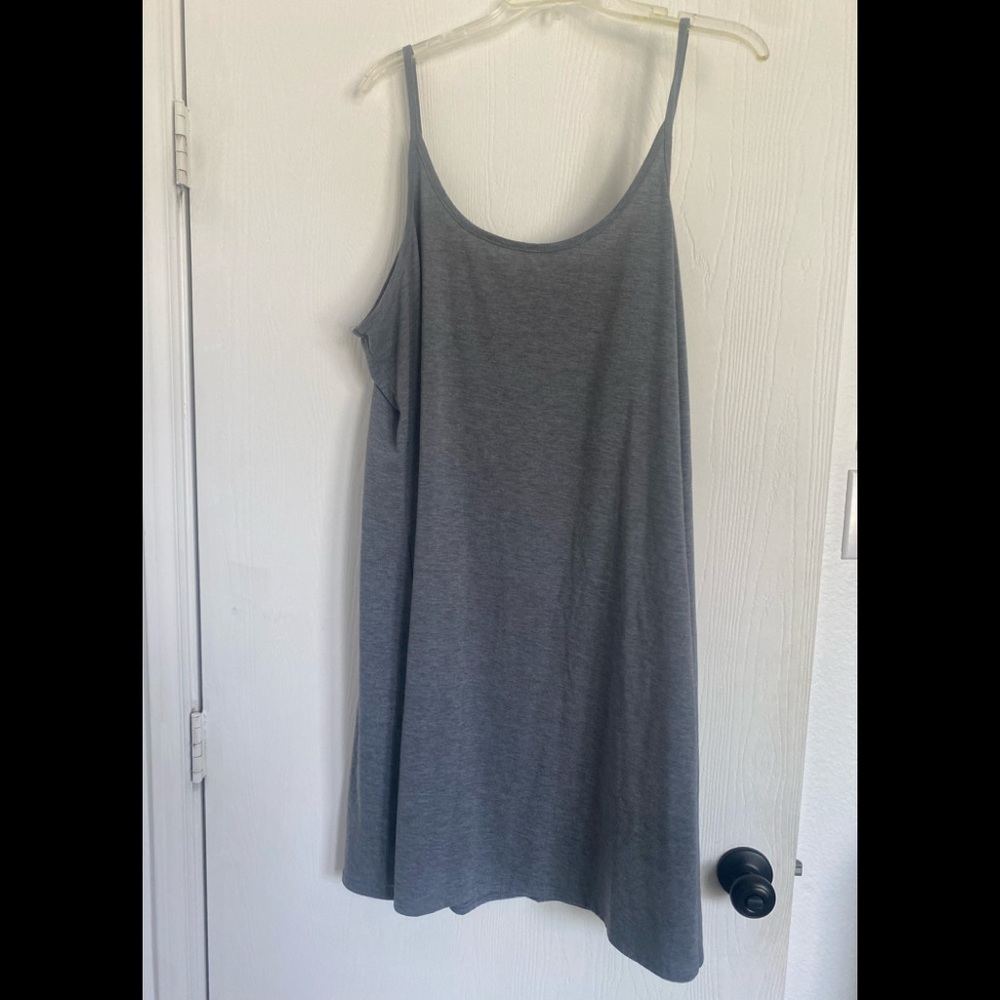 Thin grey dress.